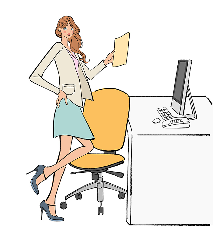 フリーイラスト（無料素材）オフィスのデスクの前で書類を持つ女性