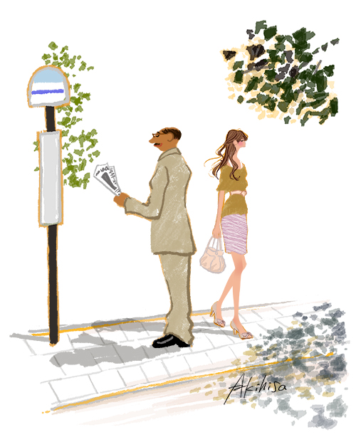 傘を差して自転車に乗る熊と女の子